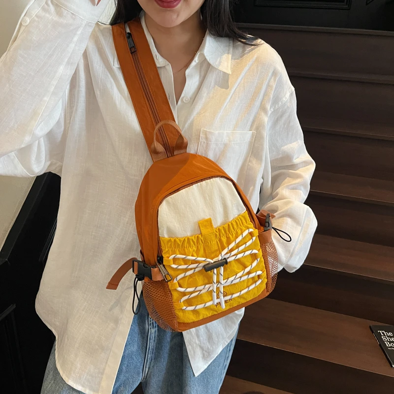 2025PKIEN撞色小型双肩包女轻便包爬山背包徒步骑行包运动小书包
