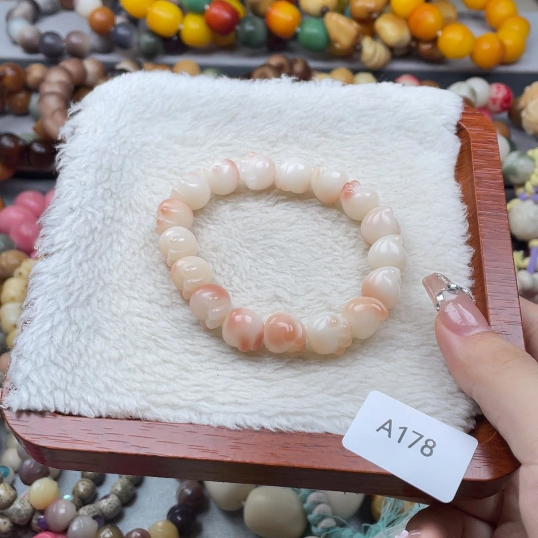 菩提根/象牙果手串瑕A178猫爪12mm一串随机