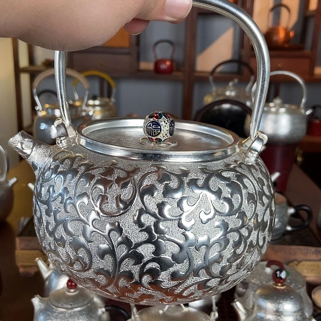 枯***道纯手工制作铜底银衣然茶壶