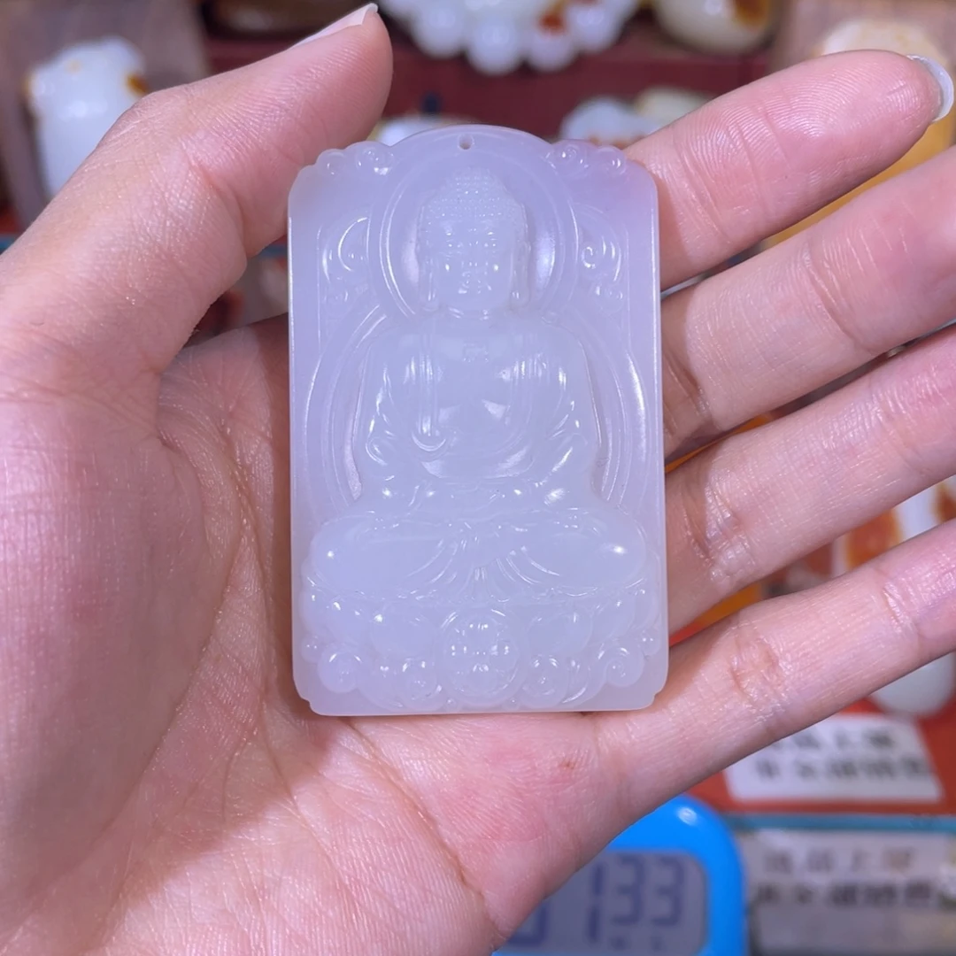 指***。和田玉未镶嵌挂件