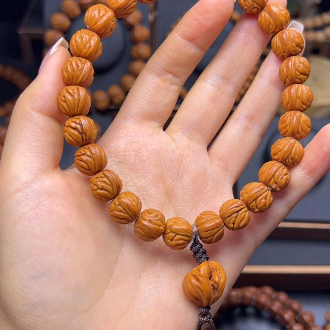 于***丝手串桃核火龙纹12手持