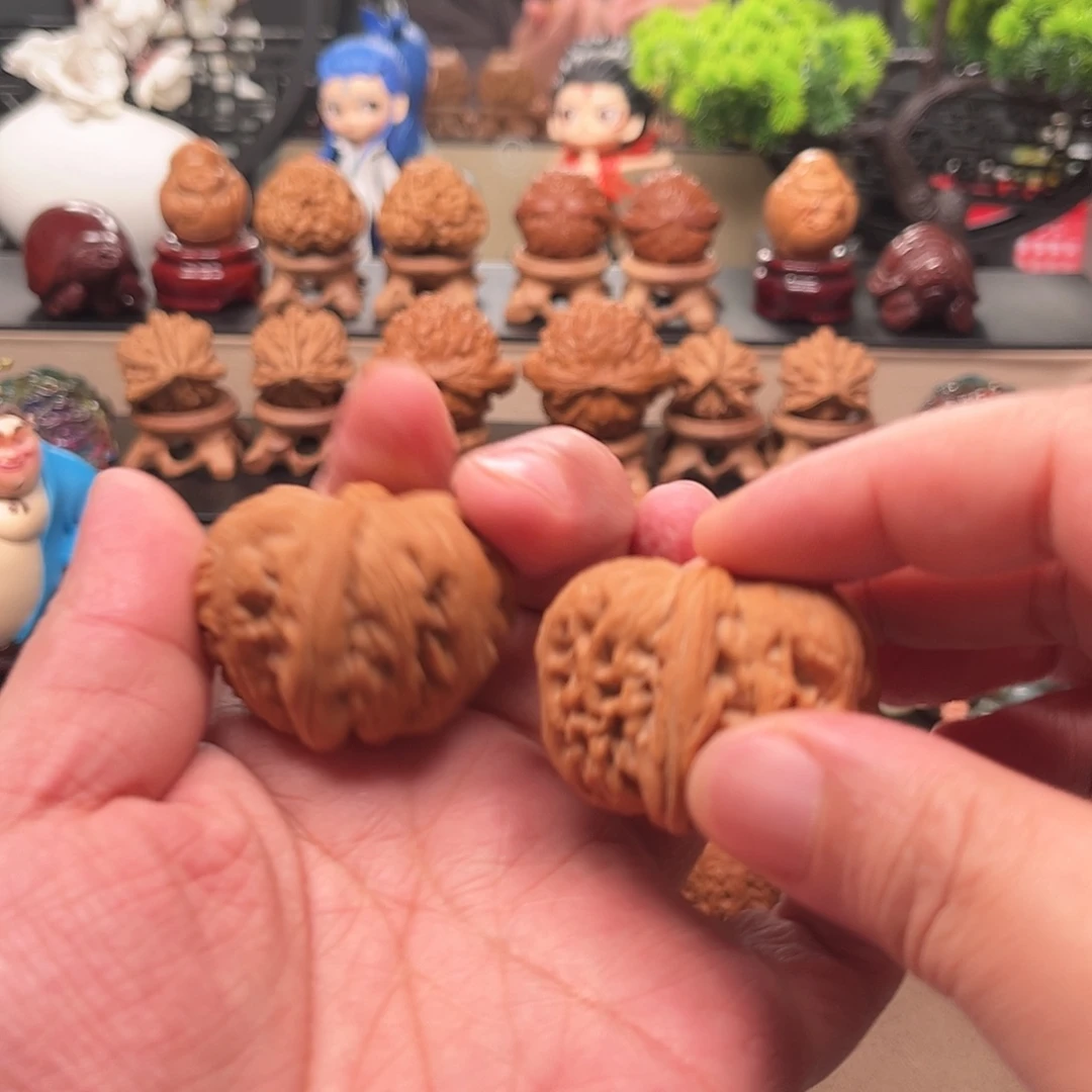 杨***东把件桃核元宝核桃