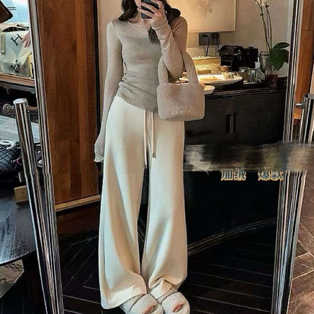 紫霞冬季白色加绒喇叭裤 7603