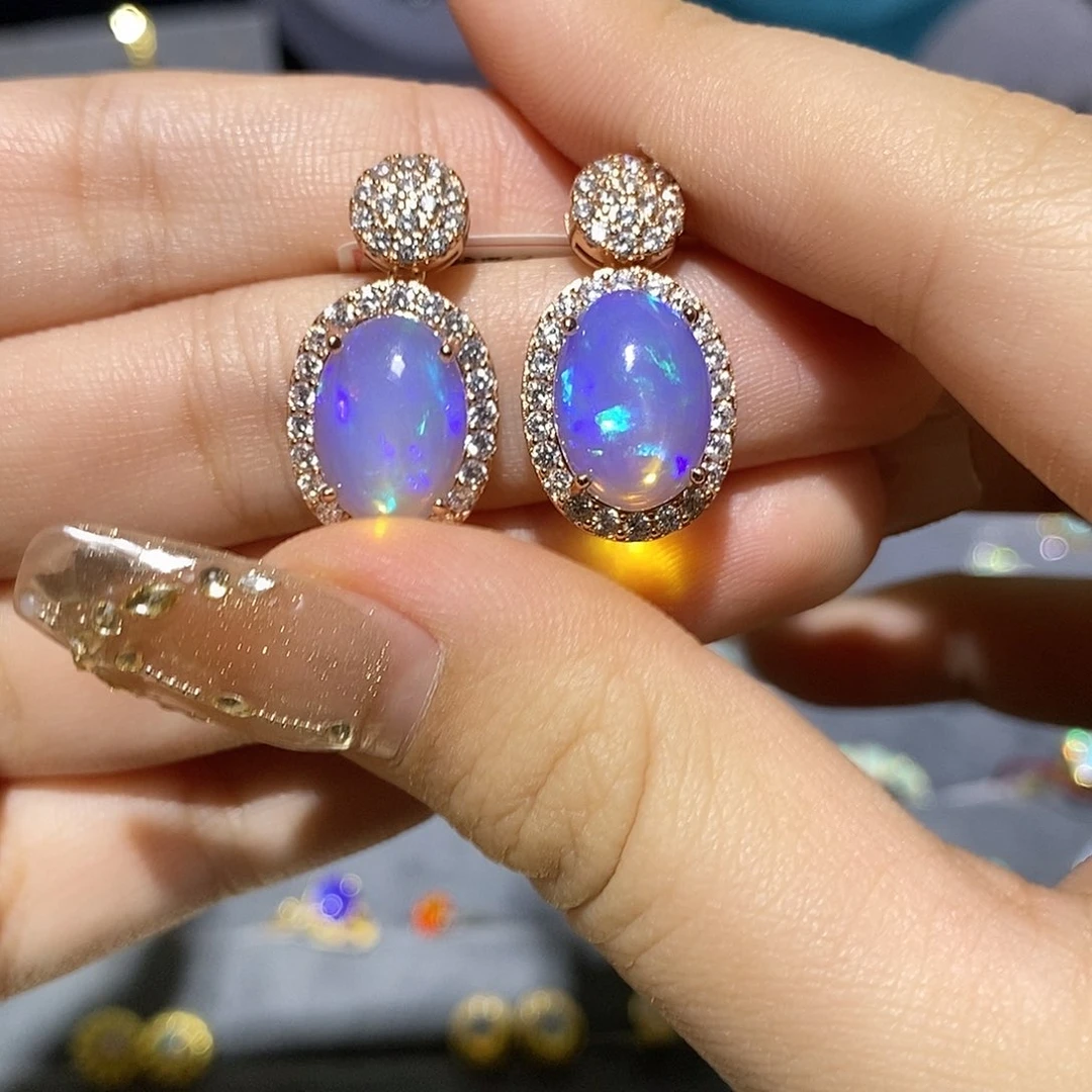 欧泊欧泊耳钉银S925镶嵌奕*