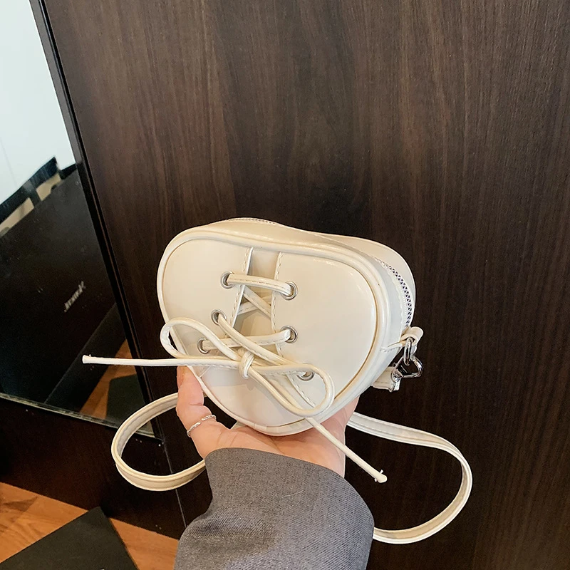 韩国ins潮个性手拎爱心包2025夏季新款时尚单肩斜跨包小众女包