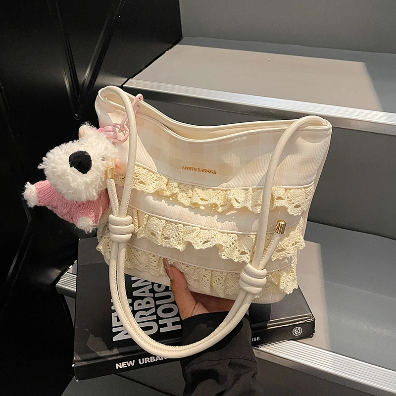 艾米兔女包2025新款休闲百搭可爱挂件小众简约洋气单肩斜挎水桶包