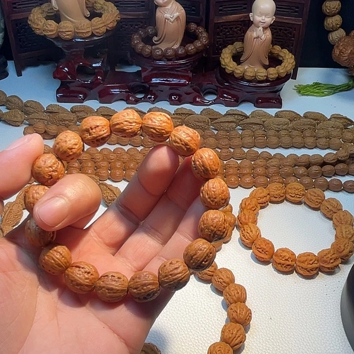 江***.桃核手串一点五小肉筋