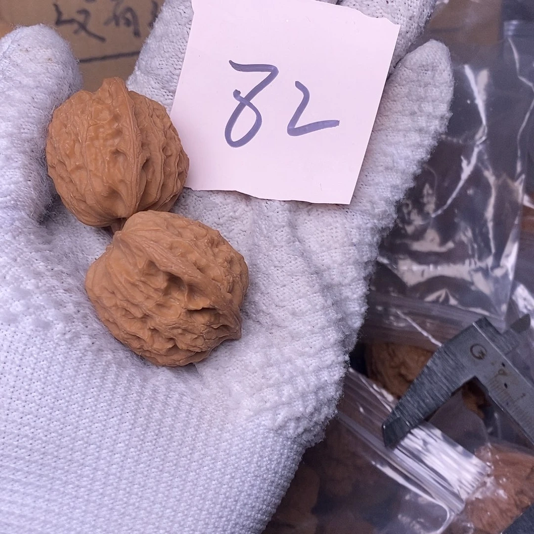 桃核把件福***帅公子帽核桃