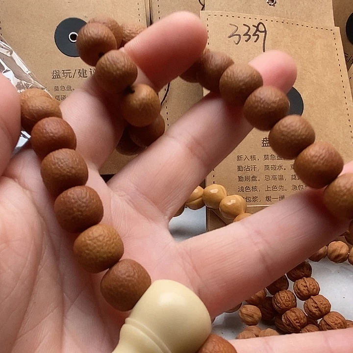 我***袄吊坠猴头核桃反油小青柑74F4