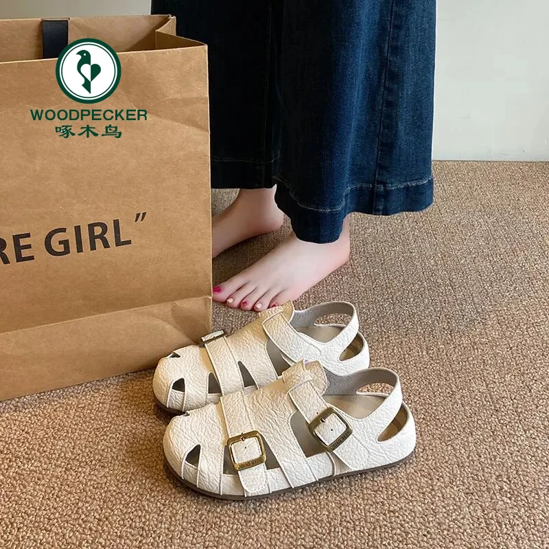 啄木鸟包头凉鞋女2025新款夏配裙子编织透气镂空勃肯鞋猪笼罗马鞋