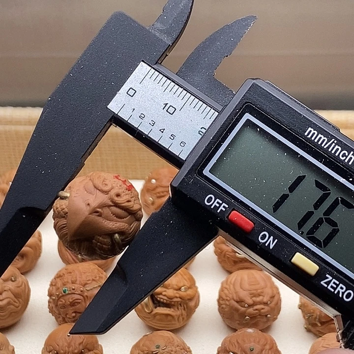 猴头单颗雕刻镶嵌大鹏鸟