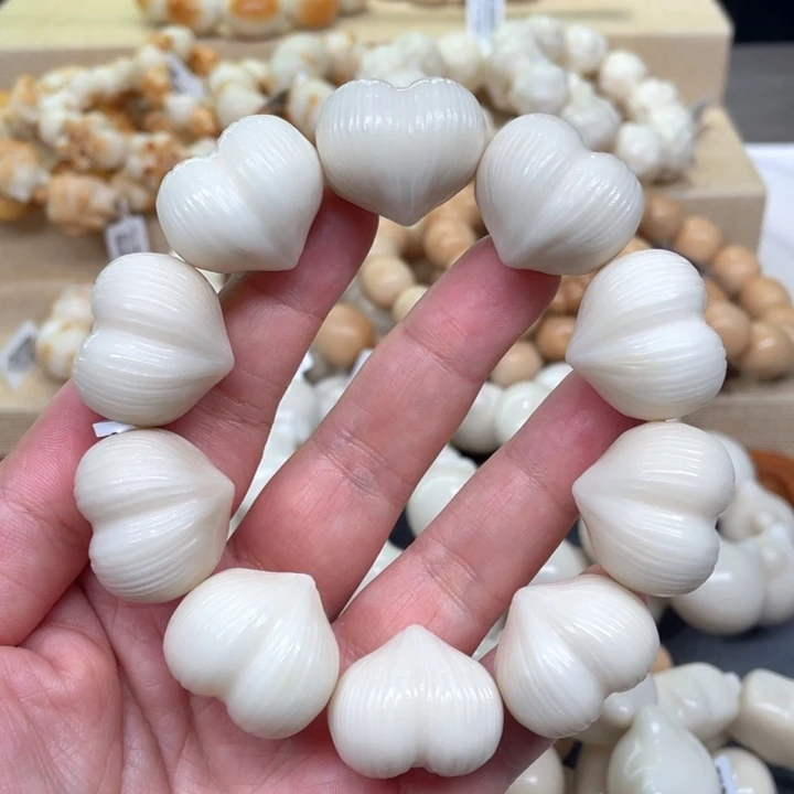 菩提根/象牙果手串拉丝屁桃爱心微瑕6-2-119