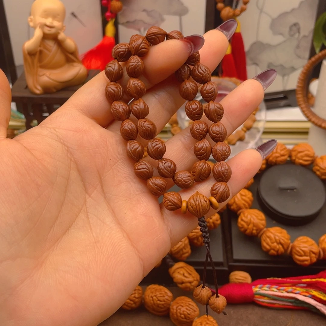 别****手串桃核红红火火。红红火火