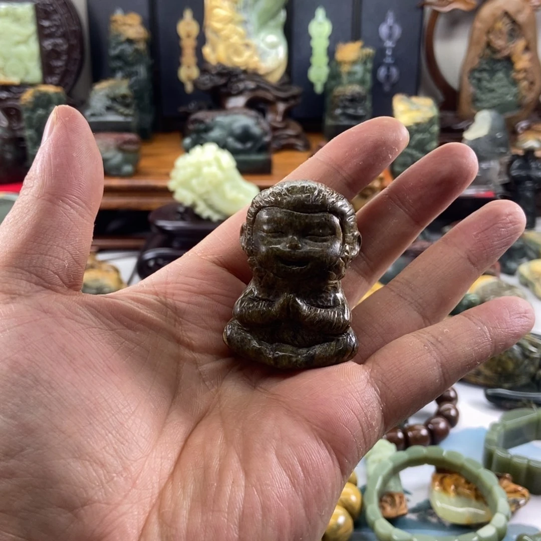 岫岩河磨玉（透闪石质玉）未镶嵌把件谜