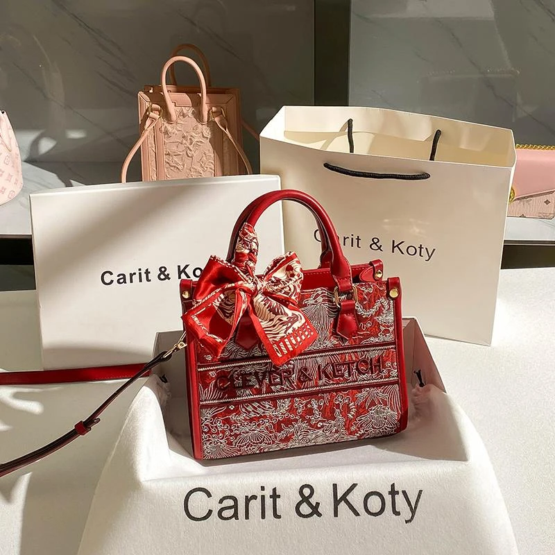 香港品牌国潮刺绣托特包包女2025轻奢新款高级感红色新娘包手提包