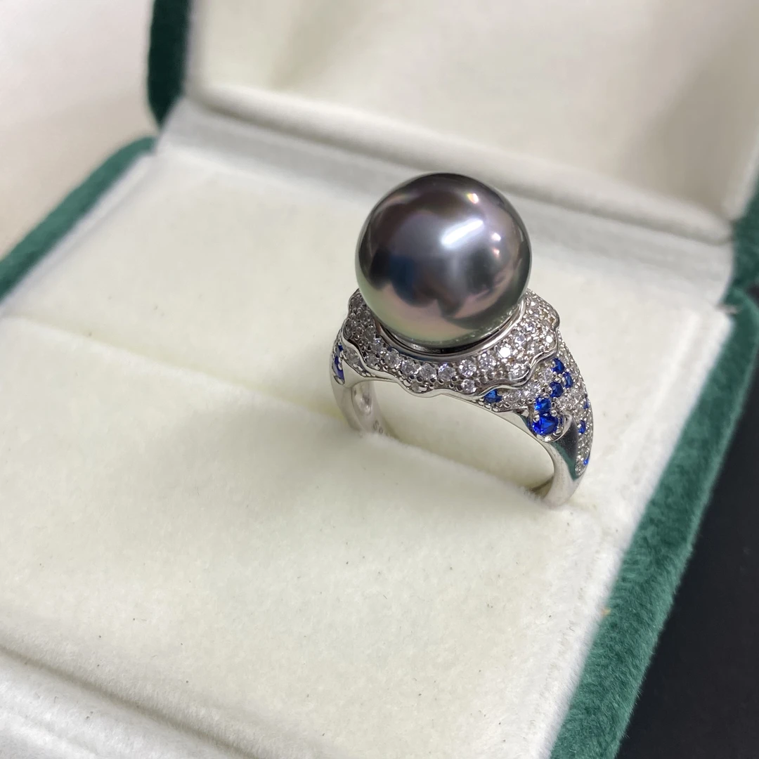 大尺寸大溪地黑珍珠海水戒指透绿透紫极强光圆几乎无暇