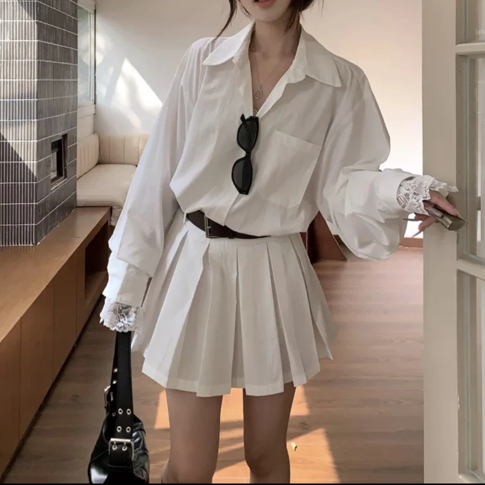 白色蕾丝拼接长袖连衣裙女春季新款设计感时尚显瘦小众气质衬衣裙