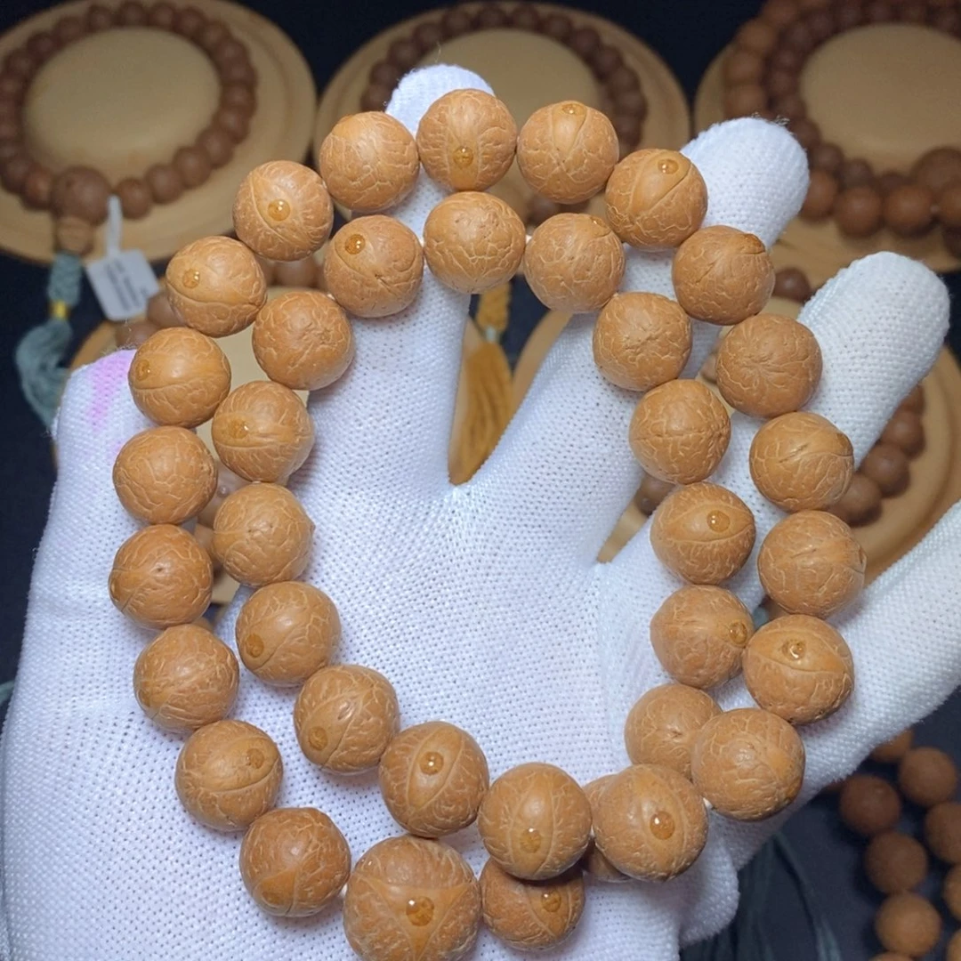 吊坠凤眼菩提14mm新籽玉华皮 红皮圆桩手持36颗