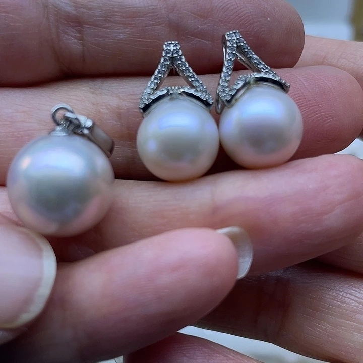 耙***子银S925镶嵌淡水珍珠耳饰