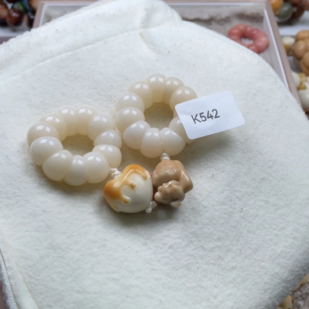 k***g菩提根/象牙果吊坠K542蒜瓣手捻13-14mm一串瑕