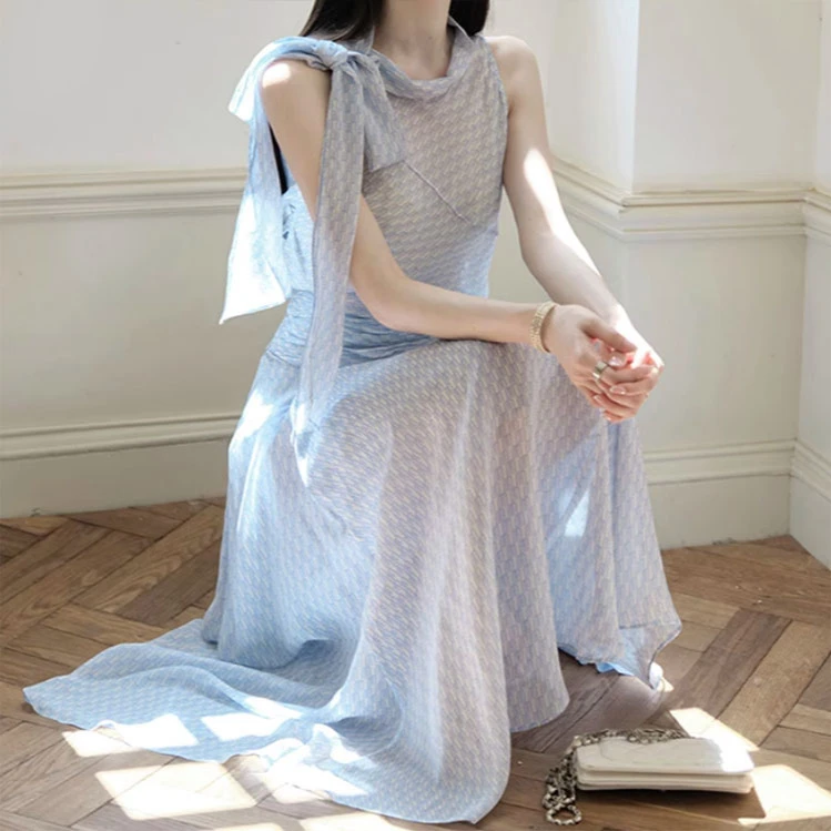 俏佳人灵动飘逸人丝乔其无袖上衣/A字半身裙套装