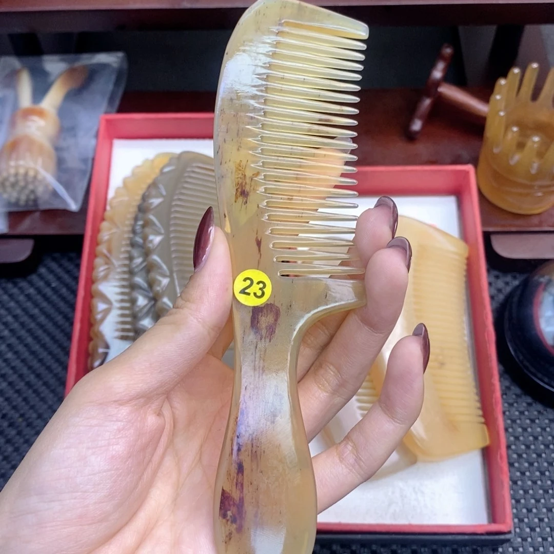 纯手工制作纯牛角梳子句****