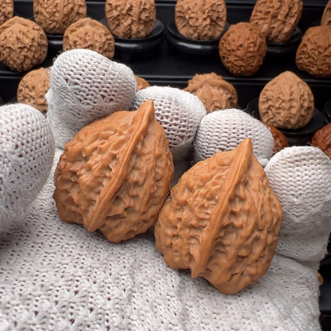 淘***蛋文玩核桃吊坠凤羽