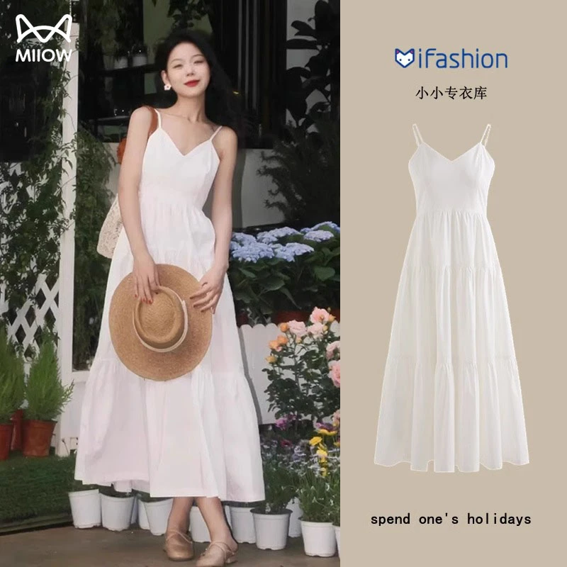 猫人白色吊带连衣裙女2025夏季新款高级法式气质海边度假穿搭裙子