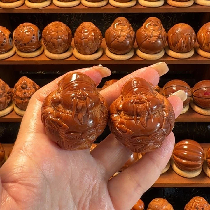 从***来巴西橄榄核雕工艺品