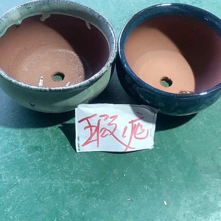 红陶口20。高11。。。。