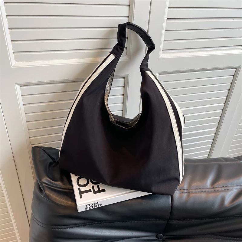 轻便尼龙包包女2025新款时尚手提单肩包简约百搭通勤腋下托特包女