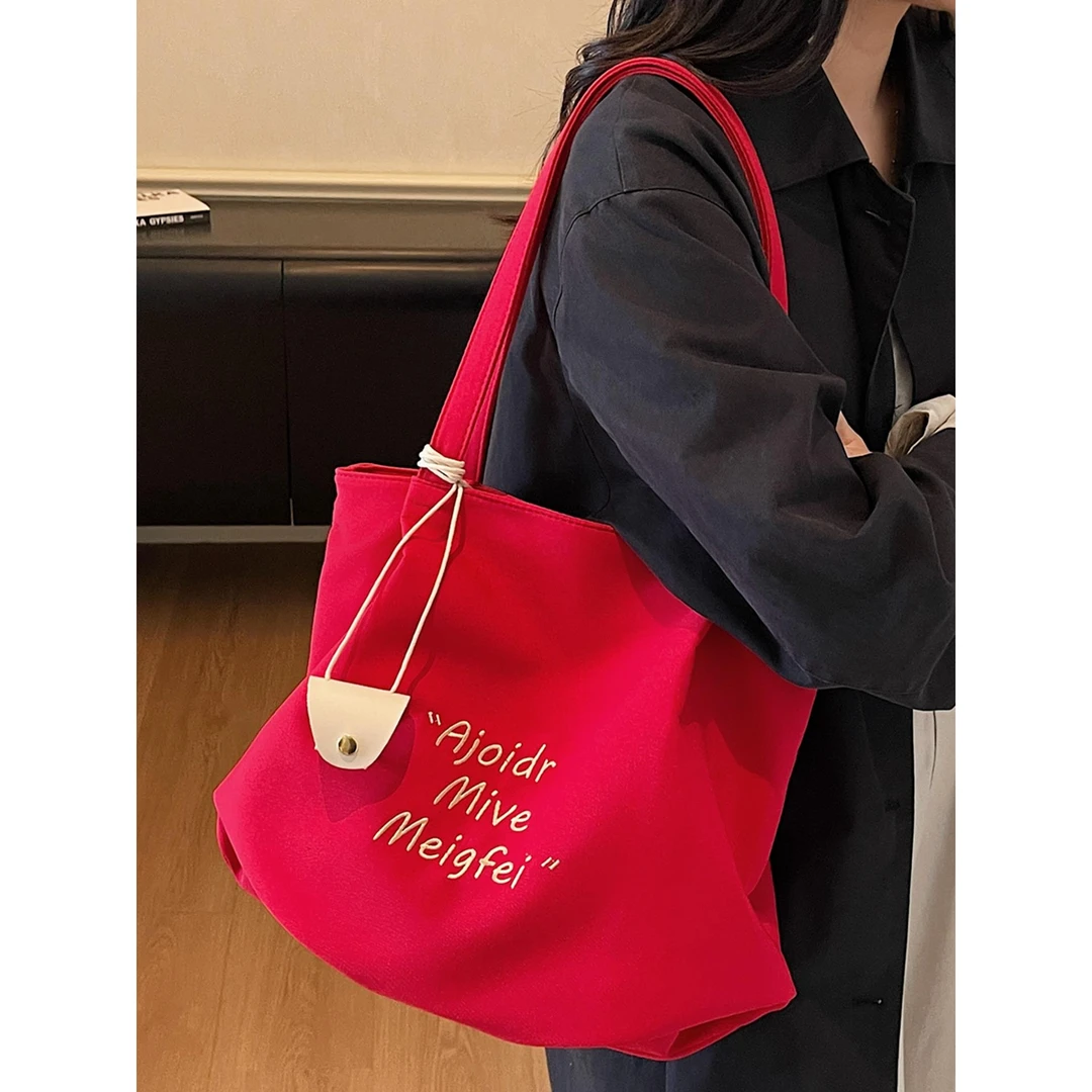 红色帆布包女大容量时尚字母单肩包韩系休闲学生通勤托特包旅行包