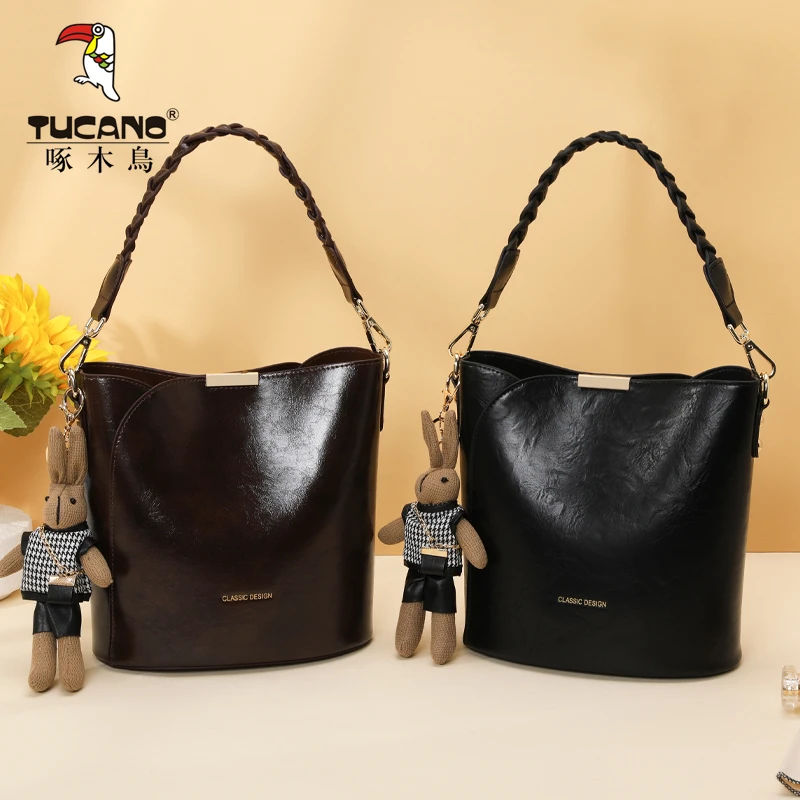 真皮【现货】啄木鸟品牌包女2025爆款百搭新款大容量水桶包通勤手提