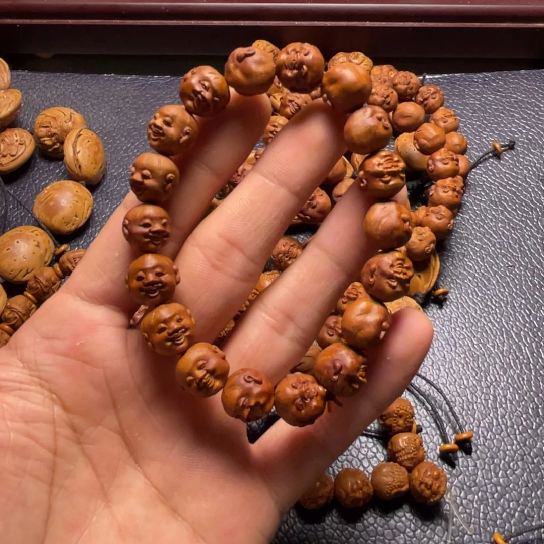 龙纹桃核雕刻瑕疵开心