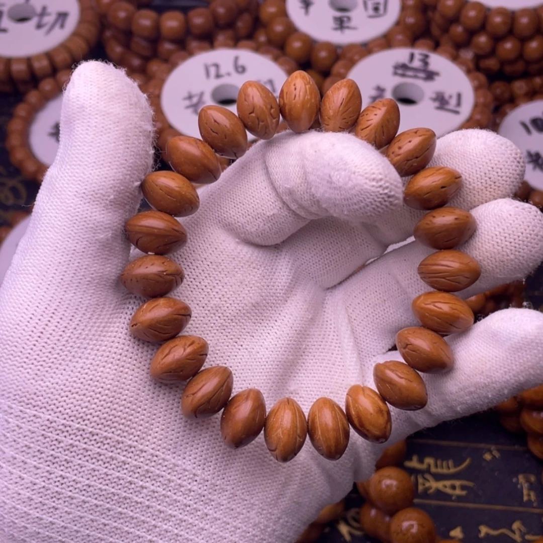 【闪购商品】吊坠桃核14龙纹桃核飞蝶光珠