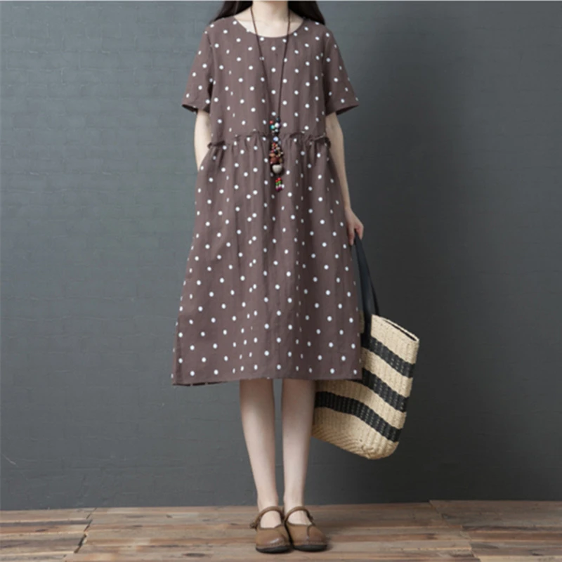 轻奢夏装女年新款文艺大码波点连衣裙棉麻宽松洋气遮肚短袖亚麻裙