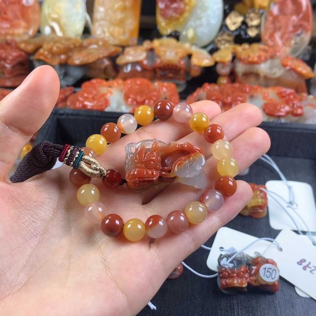 小***数石英质玉（黄龙玉）未镶嵌挂件
