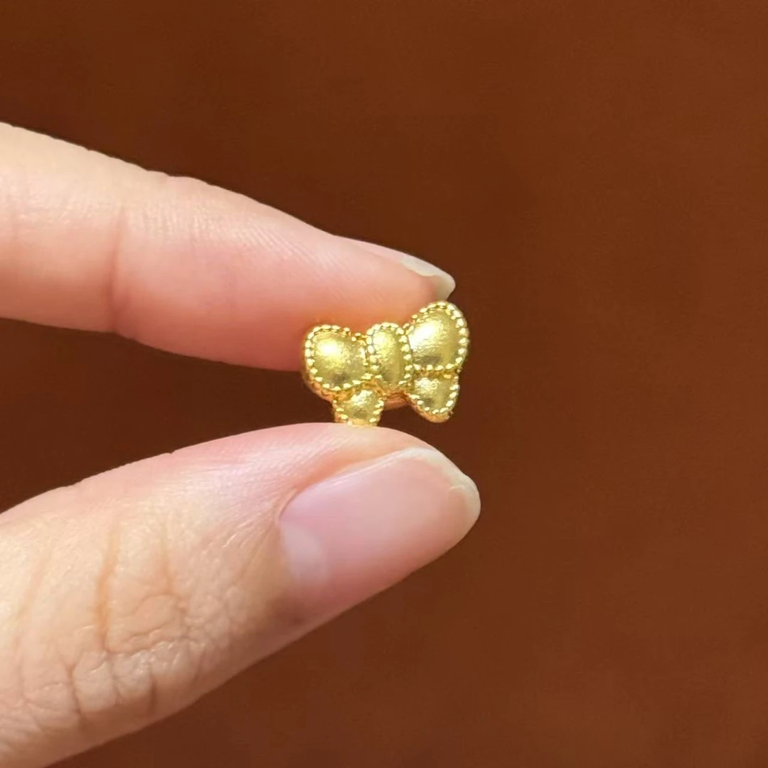 贝贝黄金 足金999 描边卡通蝴蝶结 素金 中穿 5D工艺 2328