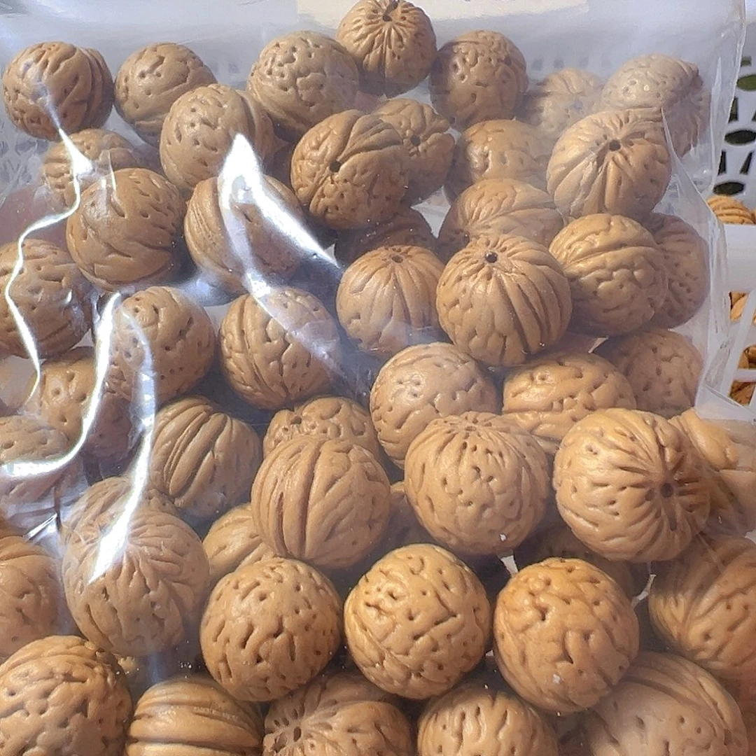 用***9桃核吊坠原皮原色金丹桃核散籽