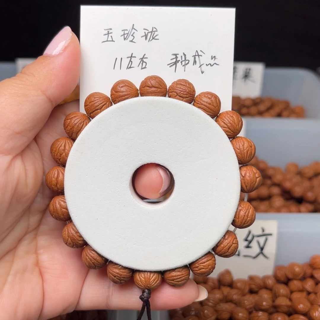 桃核吊坠11左右玉玲珑手串
