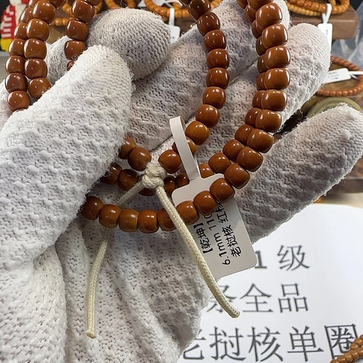 云***间手串橄榄核6.1mm 老挝核核尖红核全品