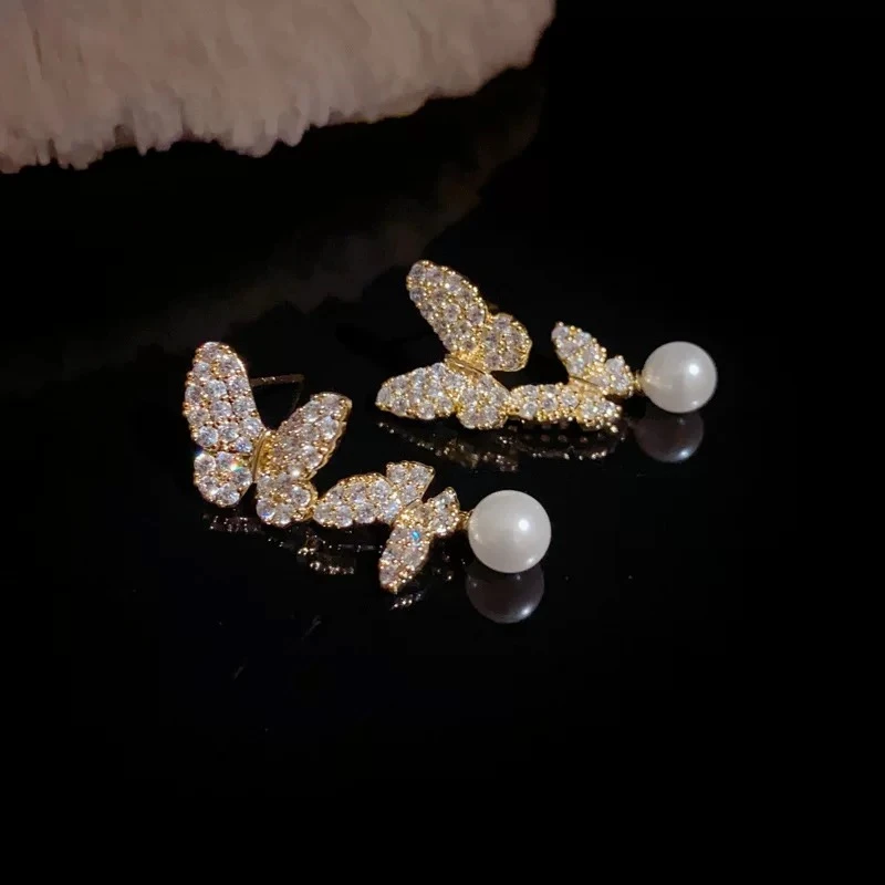 925银仿珍珠耳饰 气质耳钉灵动两只蝴蝶S925银轻奢精致镶嵌SY687