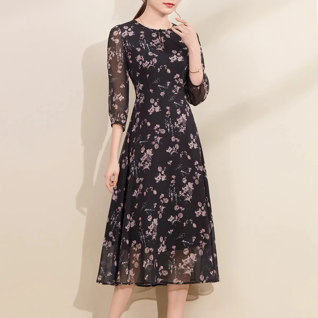 黑色碎花连衣裙女2025年春季新款圆领洋气减龄显瘦七分袖A字裙子