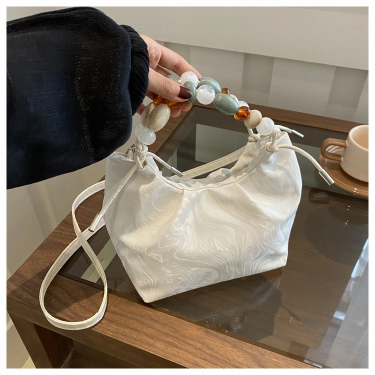 爱心腋下包手提包包女2025夏季新款复古风洋气小挎包休闲水桶包