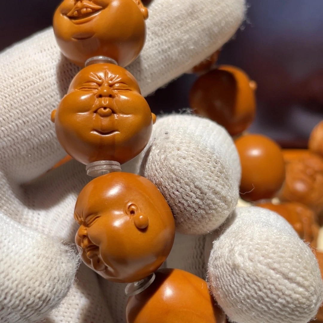 C***c橄榄核手串人生百态