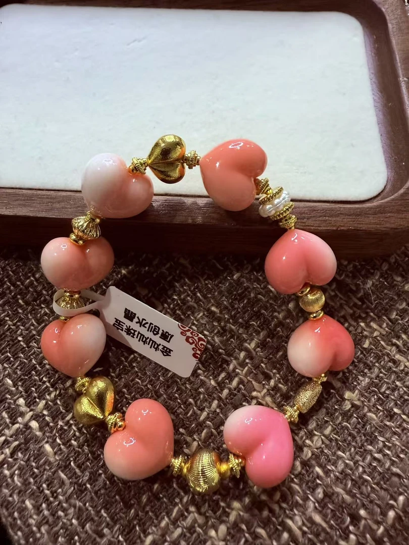 A017设计款金爱心粉粉手链