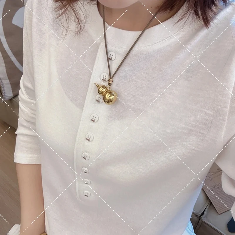 2025秋季新款柔软舒适半排扣设计感长袖T恤女简约百搭圆领小上衣