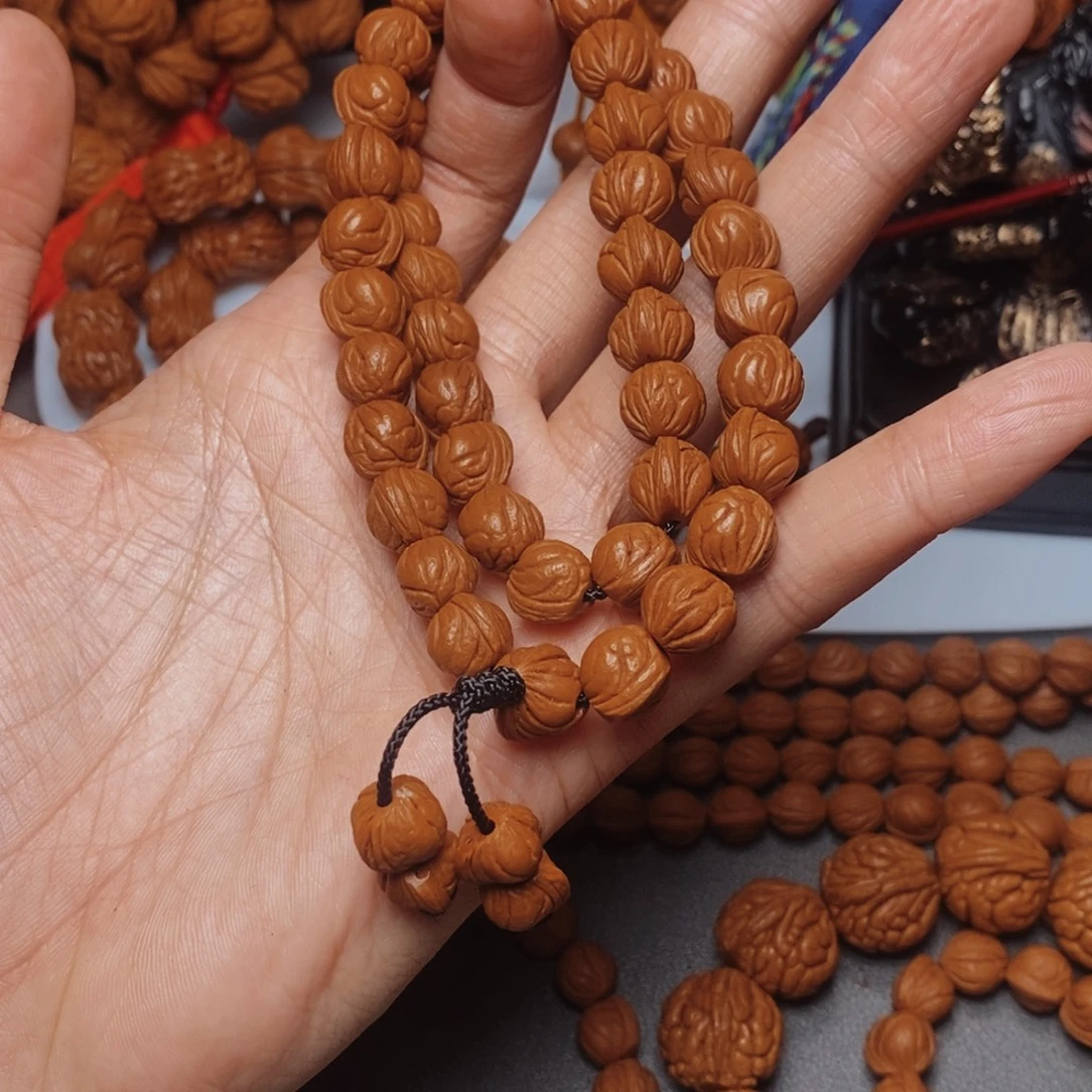 桃核吊坠桃枭手持1