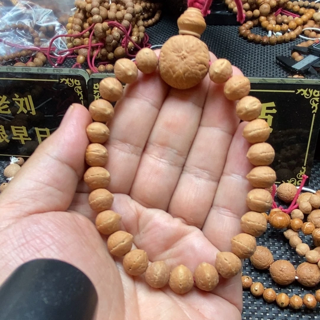 凤眼菩提吊坠9.5头货实心手串