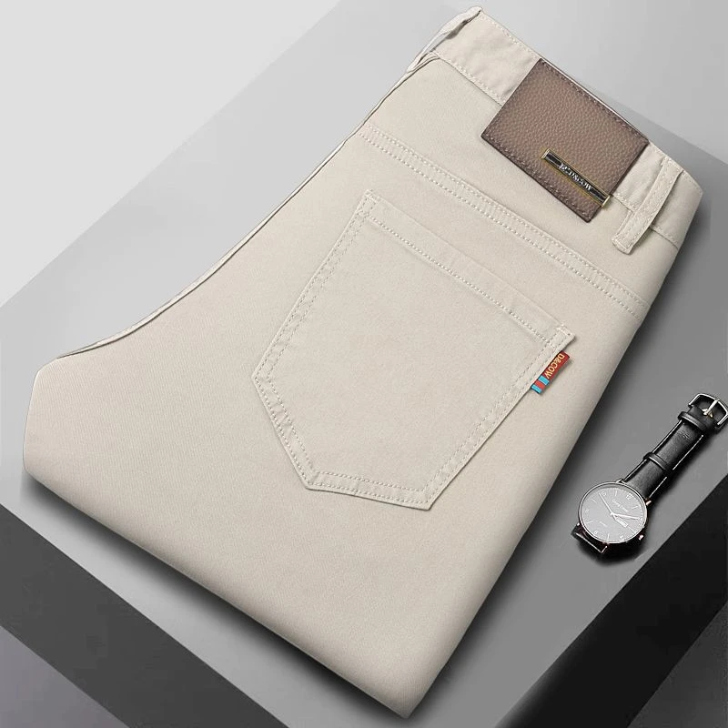 秋冬香槟杏欧版修身潮流中高腰弹力小直筒软牛仔流光风男士牛仔裤